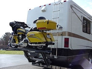 WORLDS BEST RV MOTORCYCLE LIFT FOR MOTORHOMES BY HYDRALIFT.DRIVE-ON DRIVE-OFF  
