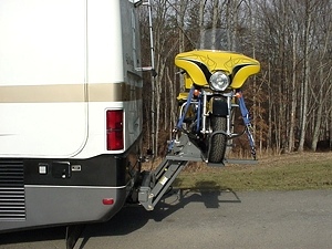WORLDS BEST RV MOTORCYCLE LIFT FOR MOTORHOMES BY HYDRALIFT.DRIVE-ON DRIVE-OFF  