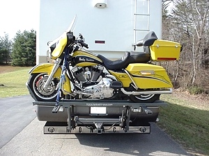 WORLDS BEST RV MOTORCYCLE LIFT FOR MOTORHOMES BY HYDRALIFT.DRIVE-ON DRIVE-OFF  