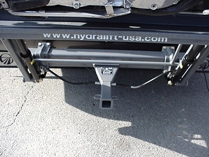 WORLDS BEST RV MOTORCYCLE LIFT FOR MOTORHOMES BY HYDRALIFT.DRIVE-ON DRIVE-OFF  