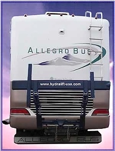 WORLDS BEST RV MOTORCYCLE LIFT FOR MOTORHOMES BY HYDRALIFT.DRIVE-ON DRIVE-OFF  