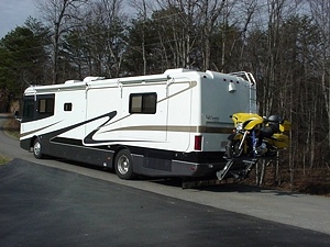 WORLDS BEST RV MOTORCYCLE LIFT FOR MOTORHOMES BY HYDRALIFT.DRIVE-ON DRIVE-OFF  